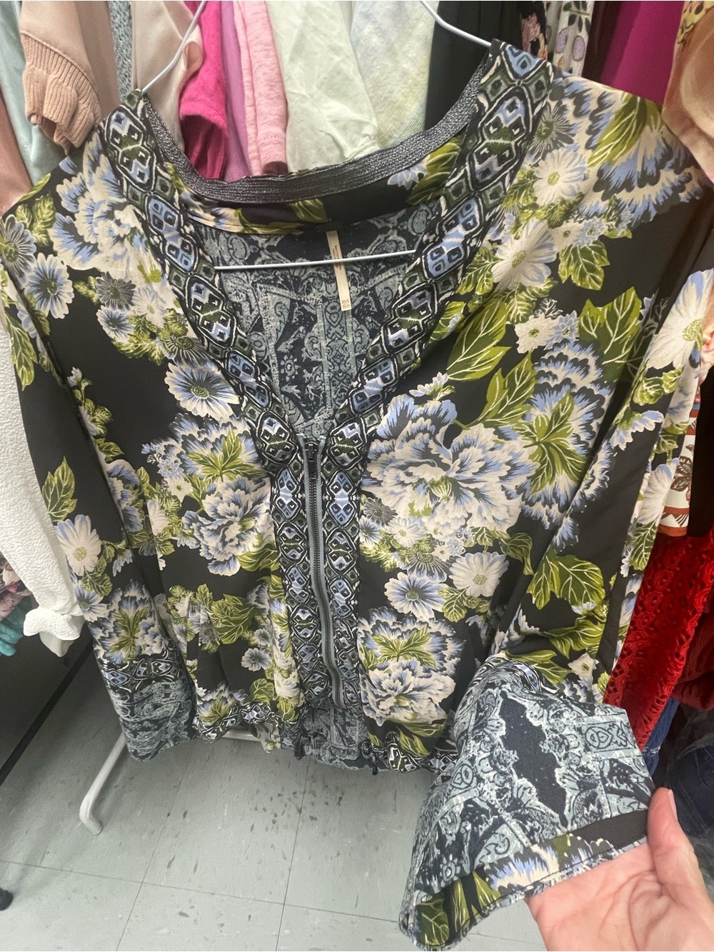 Free People navy blue Floral V-Neck zip Blouse with drawstring at waist.